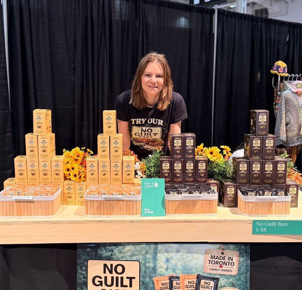 No Guilt Bars founder Leslie Fernsby behind her chocolate display in Toronto
